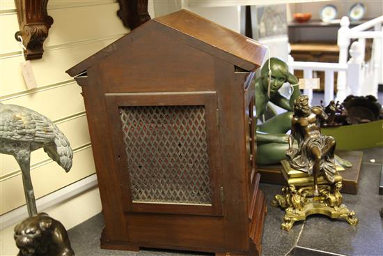 An Edwardian walnut chiming bracket clock, overall height 38in.